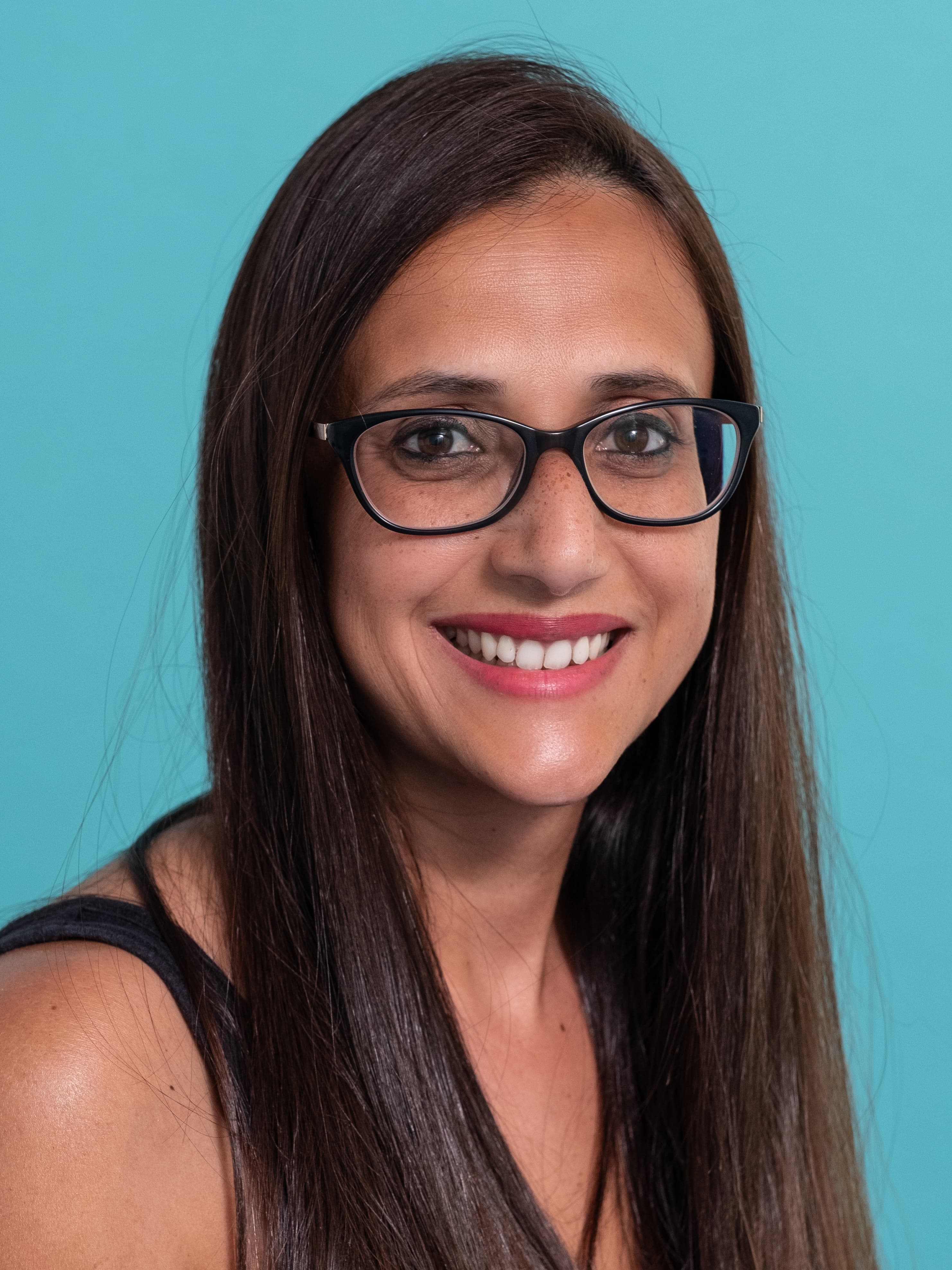 headshot of Pav smiling